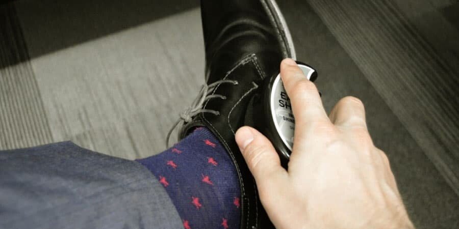 Colorful Socks On Black Shoes