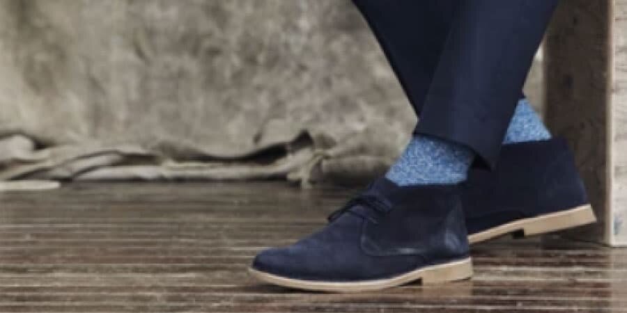 Light-Colored Socks With Dull Blue Shoes
